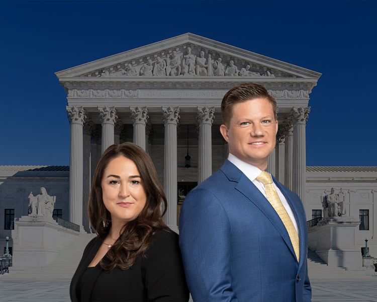 Group photo of Urbelis Law, LLC with the Supreme Court of Justice in the background